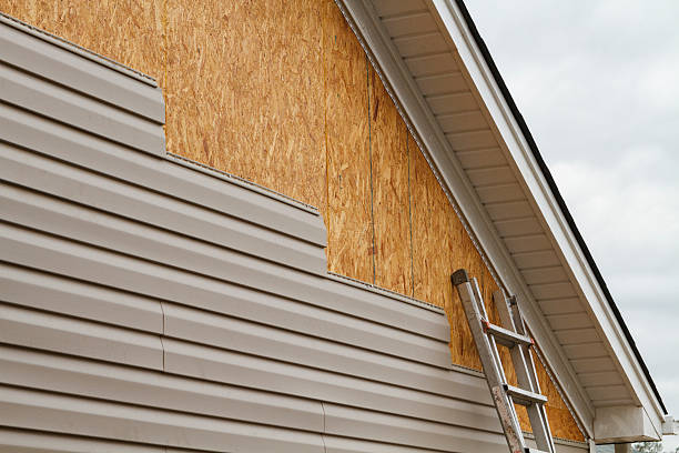 Professional Siding technician working in South Boston, VA